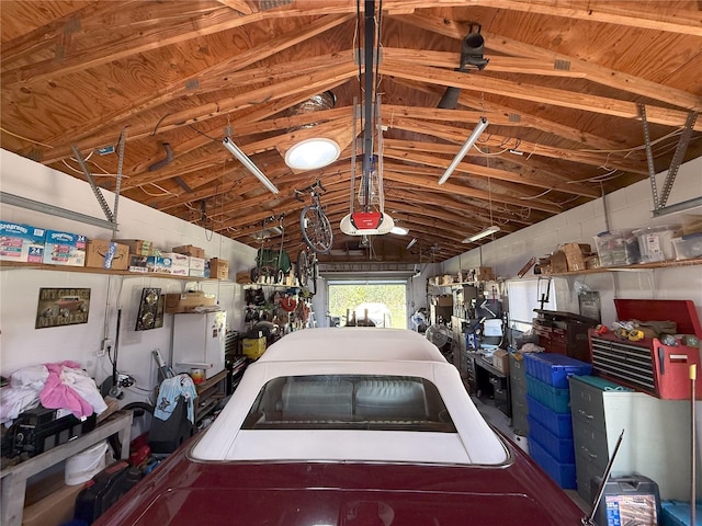 garage featuring a garage door opener