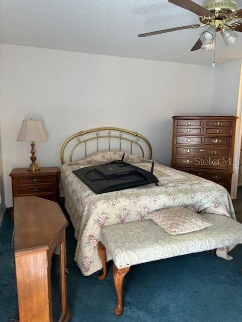 bedroom featuring carpet flooring and ceiling fan