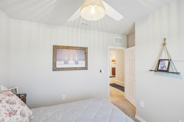 bedroom with light colored carpet and ceiling fan