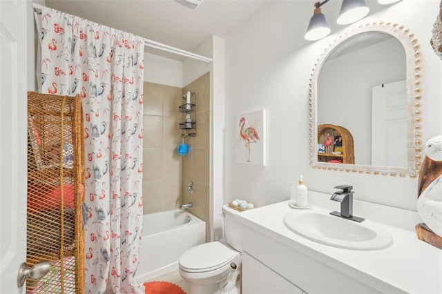 full bathroom featuring toilet, vanity, and shower / bathtub combination with curtain