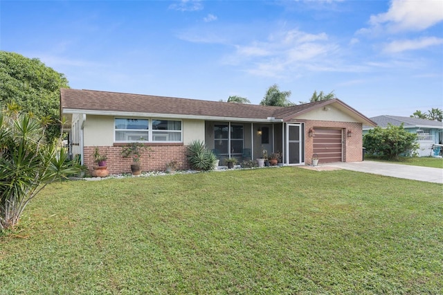 single story home featuring a front yard and a garage