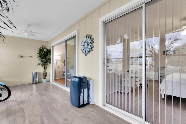 interior space featuring ceiling fan