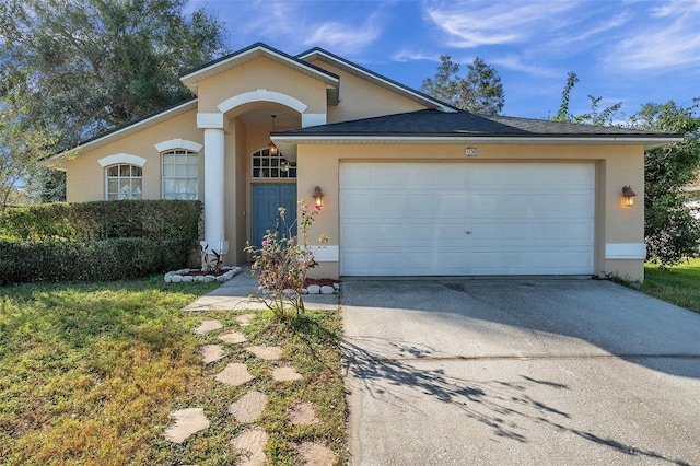 single story home with a garage