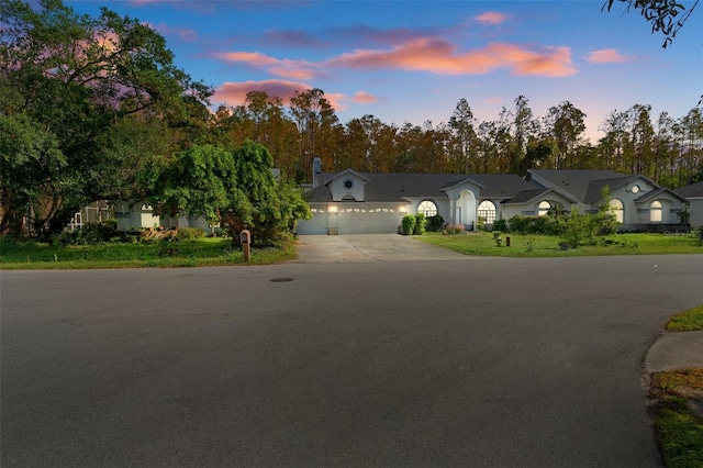 view of front of property with a garage