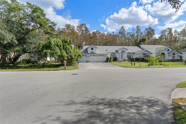 view of front of property featuring a garage