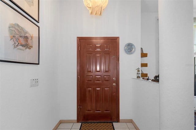 view of tiled foyer entrance