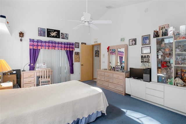 carpeted bedroom with high vaulted ceiling and ceiling fan