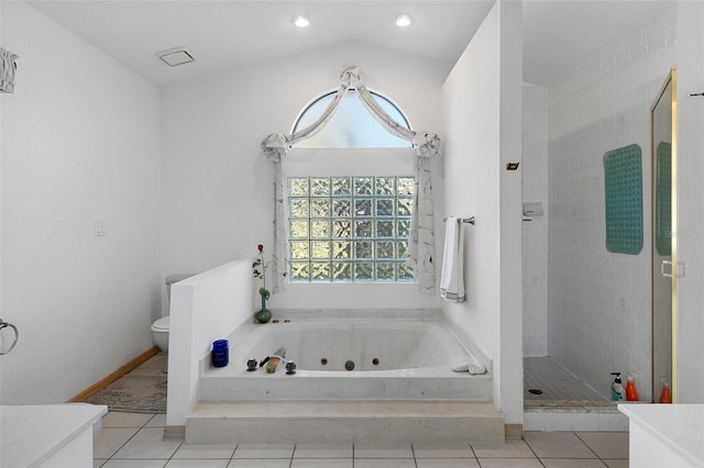 bathroom featuring independent shower and bath, vaulted ceiling, toilet, and tile patterned flooring