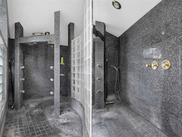 interior space featuring tile walls and a tile shower