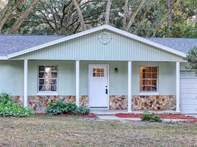 property entrance featuring a porch