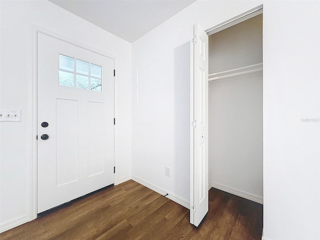 foyer featuring dark wood-type flooring