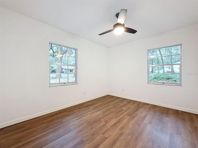 unfurnished room with wood-type flooring and ceiling fan