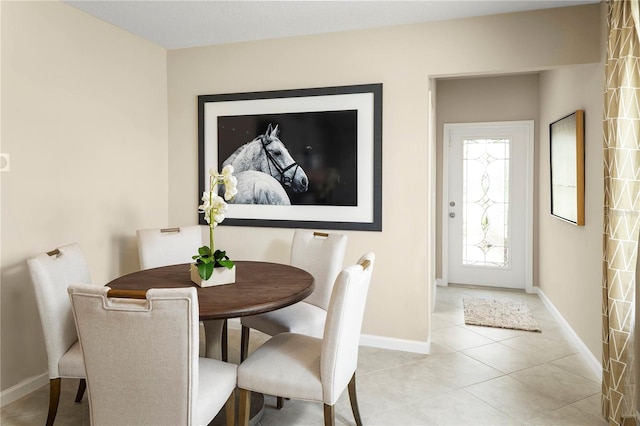 dining space with light tile patterned floors