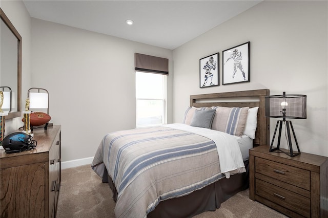 bedroom with light colored carpet