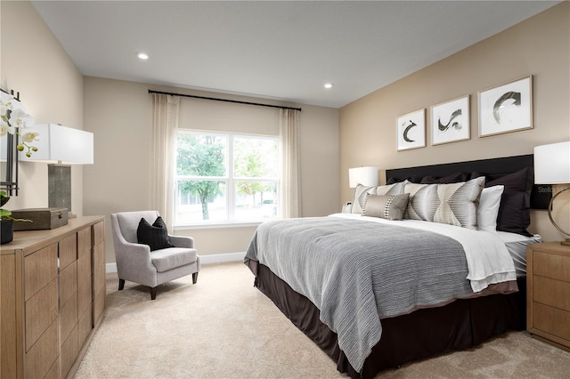 bedroom with light colored carpet