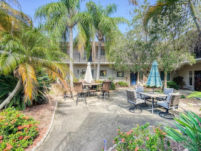 7719 Cosme Dr Unit 1, Hudson, FL 34667 - view of patio with outdoor dining area