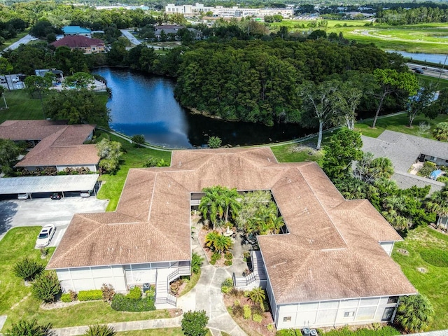 drone / aerial view with a water view