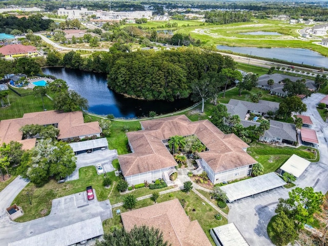 bird's eye view featuring a water view and a residential view