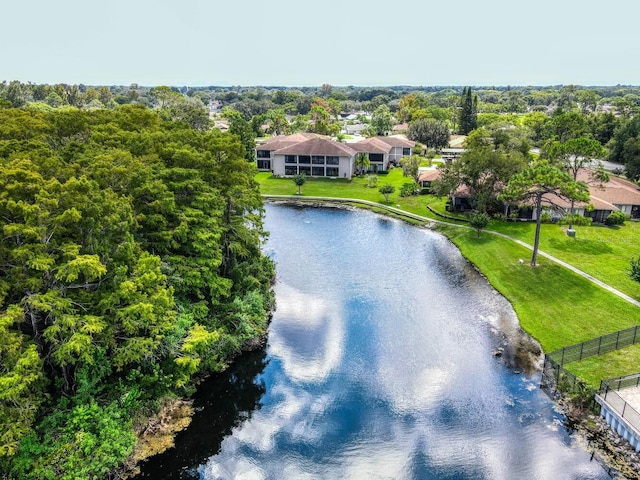 7719 Cosme Dr Unit 1, Hudson, FL 34667 - aerial perspective of suburban area with a nearby body of water and a tree filled landscape