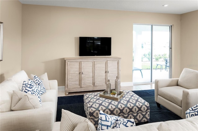 tiled living room featuring a wealth of natural light