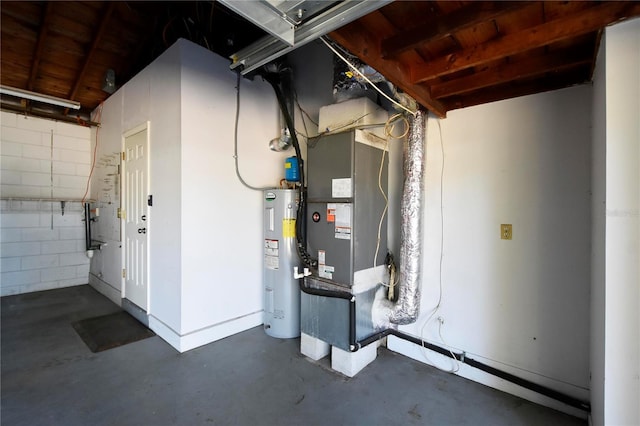 utility room featuring water heater