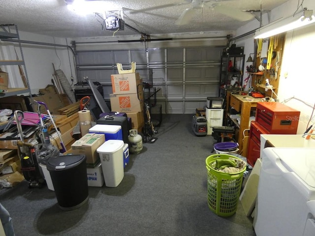 garage featuring a garage door opener and washer / clothes dryer