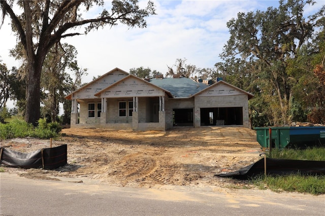 property in mid-construction featuring a garage