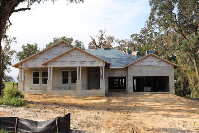 property in mid-construction featuring a garage