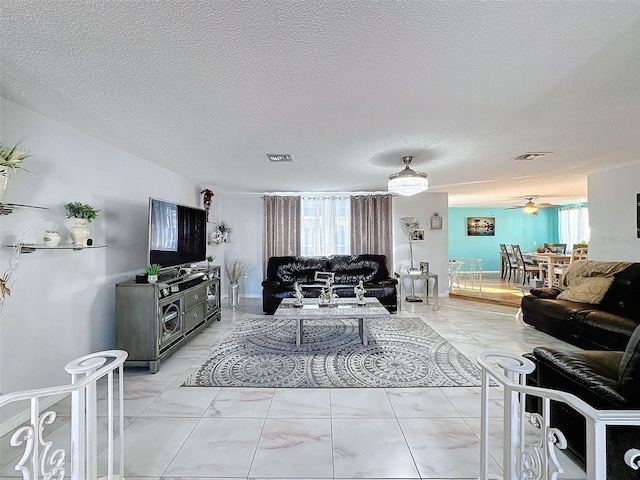 living room featuring a textured ceiling