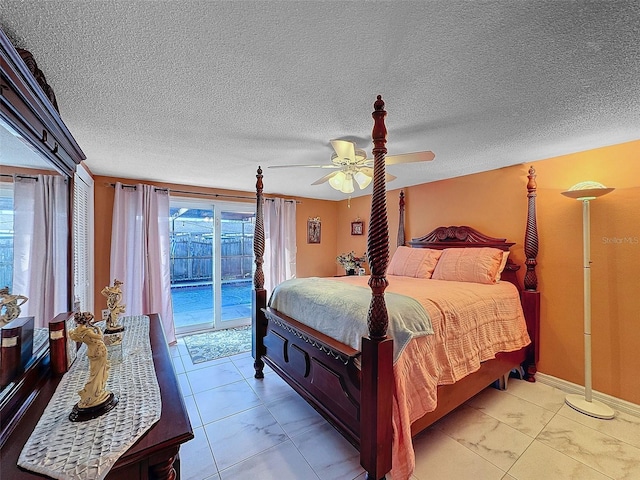 tiled bedroom with a textured ceiling, access to outside, and ceiling fan