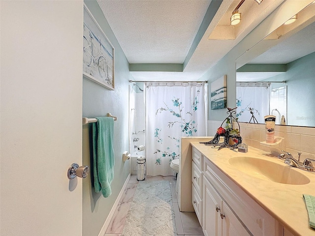 bathroom featuring vanity, toilet, a textured ceiling, and a shower with shower curtain