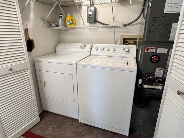 laundry room with separate washer and dryer