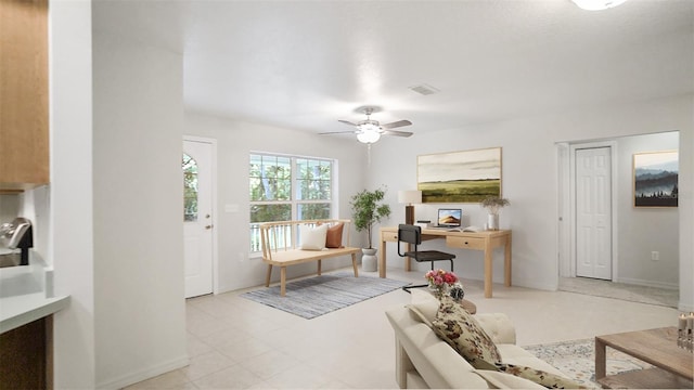 living room featuring ceiling fan