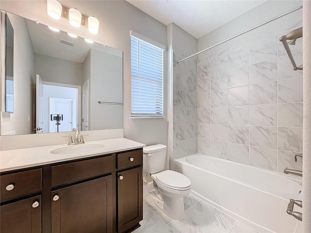 bathroom with toilet, visible vents, shower / washtub combination, and vanity