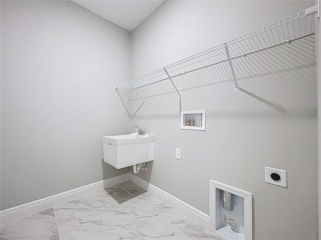 laundry area featuring hookup for a washing machine, hookup for an electric dryer, laundry area, baseboards, and marble finish floor