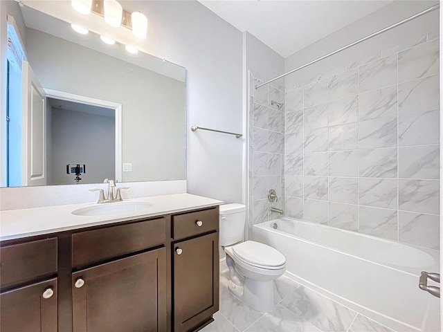 bathroom with marble finish floor, vanity, toilet, and shower / bathtub combination