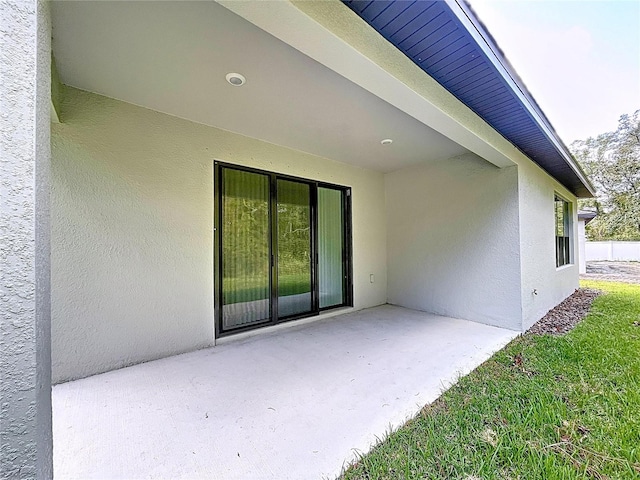 view of patio / terrace with fence