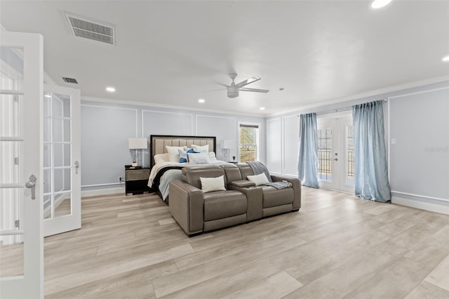 bedroom with french doors, light hardwood / wood-style floors, access to exterior, ceiling fan, and crown molding