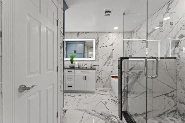 14485 Switch Back Rd, Brooksville, FL 34609 - bathroom featuring a marble finish shower, vanity, marble tiled flooring, and a soaking tub