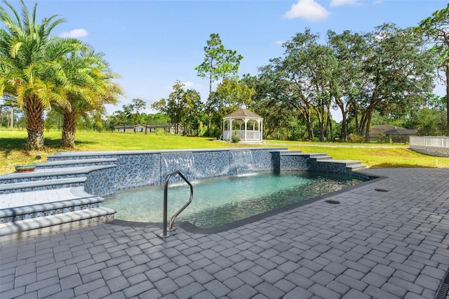 view of pool with a lawn and a gazebo