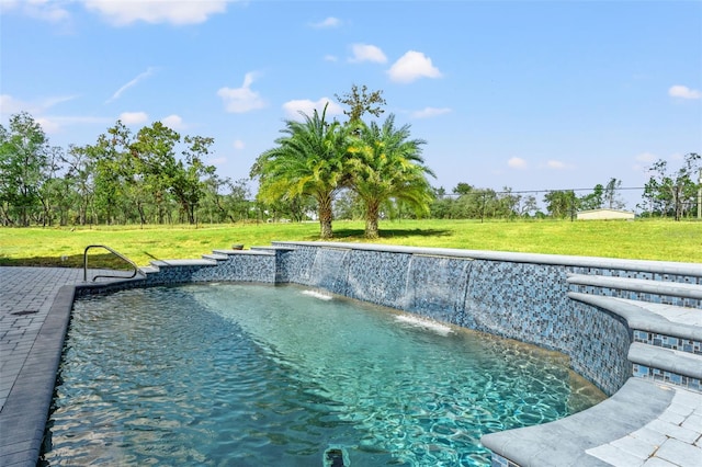 view of pool with a lawn and pool water feature