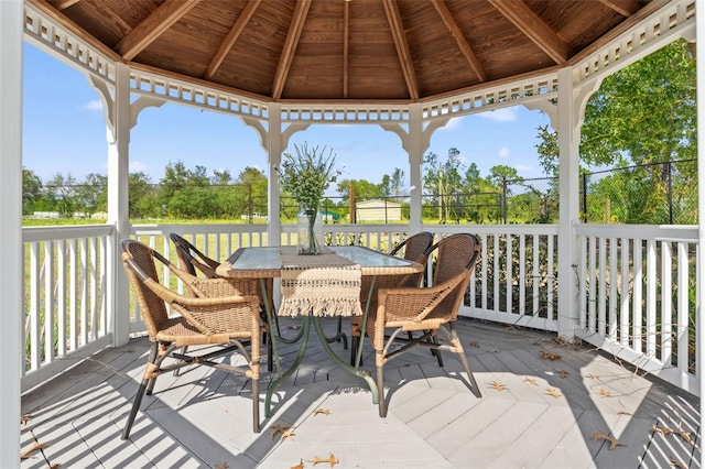 14485 Switch Back Rd, Brooksville, FL 34609 - wooden deck with a gazebo and outdoor dining space