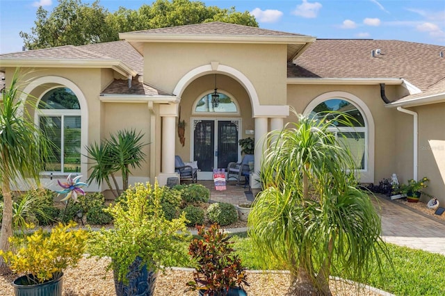 doorway to property featuring a patio