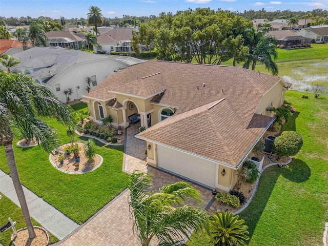8231 Coral Creek Loop, Hudson, FL 34667 - aerial perspective of suburban area featuring a large body of water