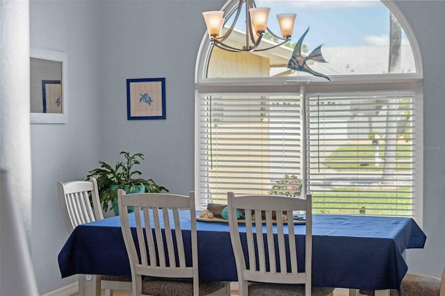 8231 Coral Creek Loop, Hudson, FL 34667 - dining space featuring a chandelier
