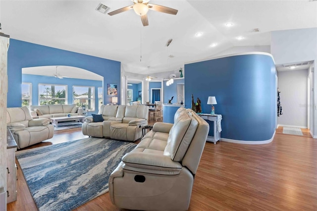 8231 Coral Creek Loop, Hudson, FL 34667 - living room featuring a ceiling fan, wood finished floors, lofted ceiling, recessed lighting, and baseboards
