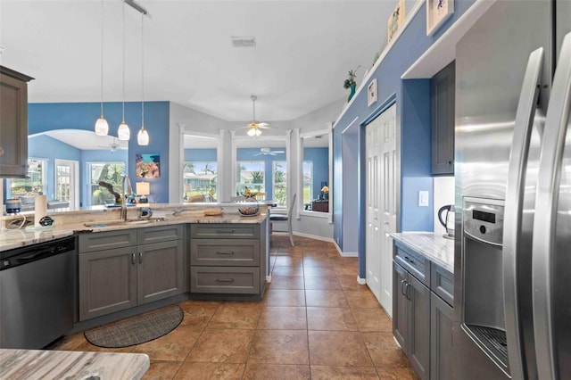 8231 Coral Creek Loop, Hudson, FL 34667 - kitchen with appliances with stainless steel finishes, a ceiling fan, healthy amount of natural light, and a sink