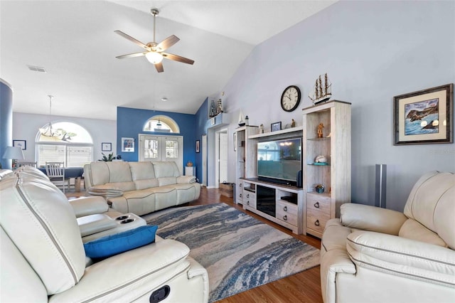 8231 Coral Creek Loop, Hudson, FL 34667 - living area with a ceiling fan, wood finished floors, and lofted ceiling