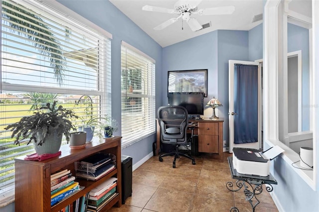 8231 Coral Creek Loop, Hudson, FL 34667 - tiled home office featuring healthy amount of natural light, vaulted ceiling, baseboards, and ceiling fan