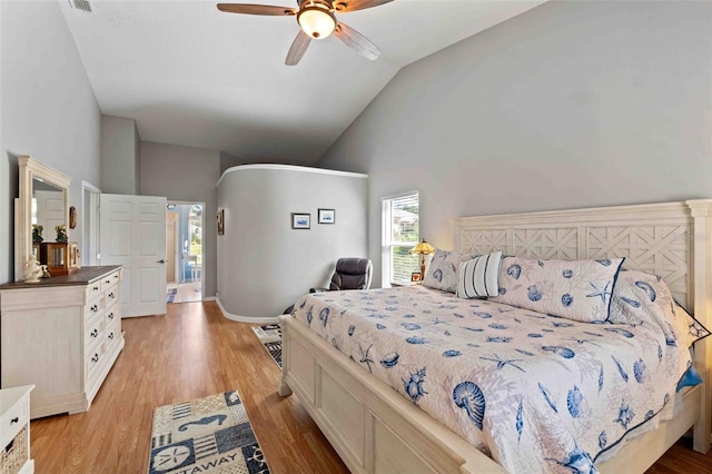 8231 Coral Creek Loop, Hudson, FL 34667 - bedroom featuring high vaulted ceiling, light wood finished floors, and ceiling fan